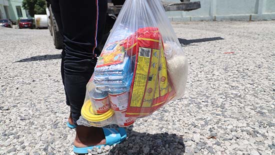 Woman carrying Kit